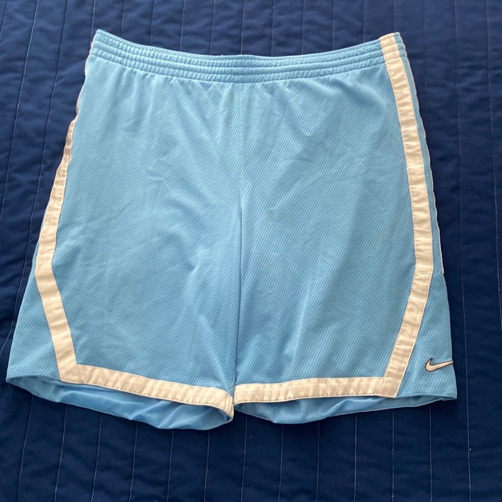 Baby blue and white men’s nike basketball shorts size large